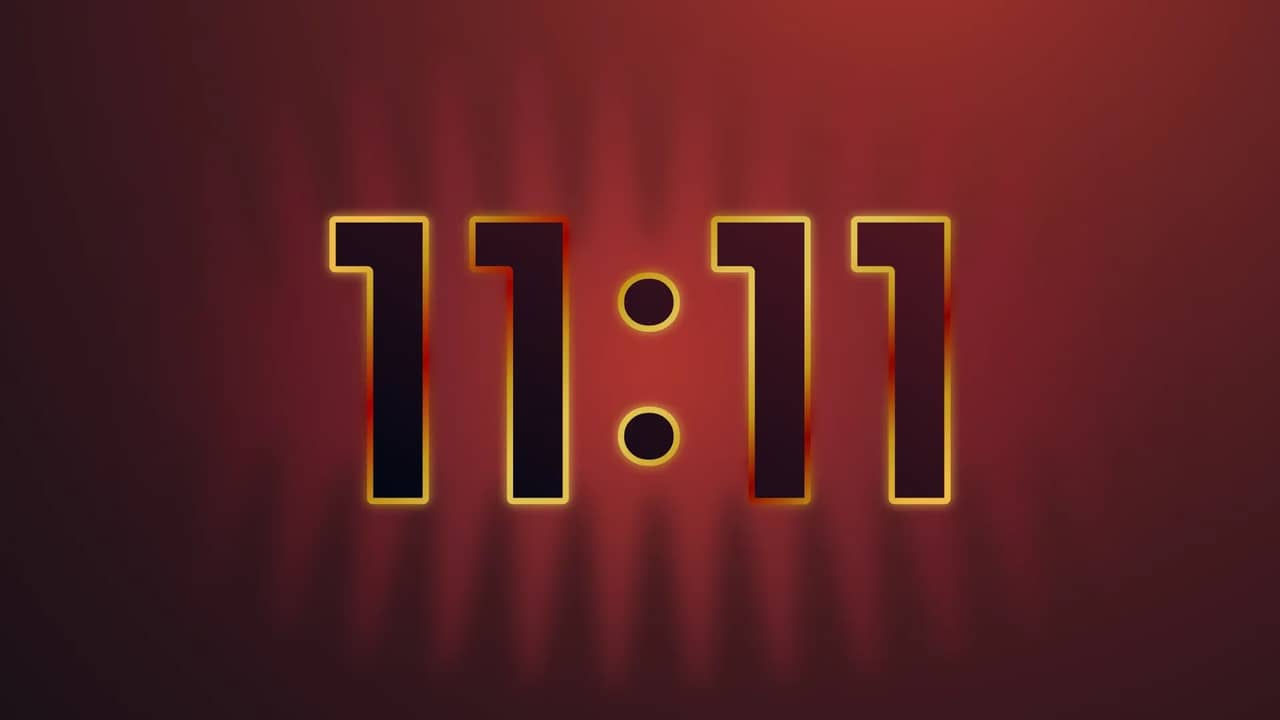 Golden numbers "11:11" glowing on a dark red background.