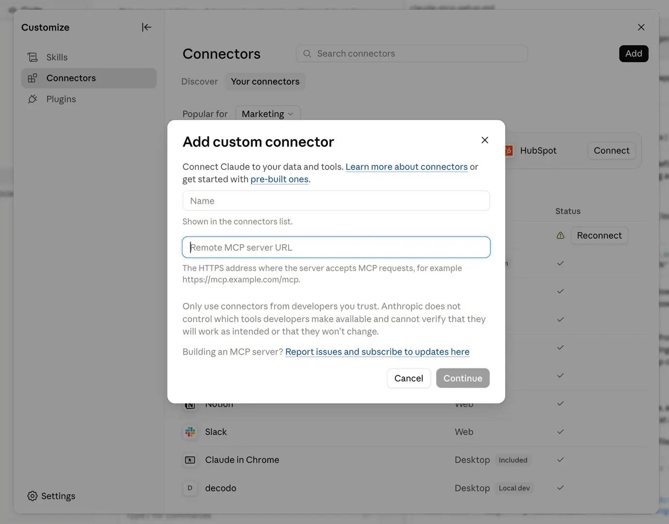 Screenshot of Claude Desktop's "Add custom connector" dialog box, featuring input fields for Name and Remote MCP server URL, alongside a security trust warning.