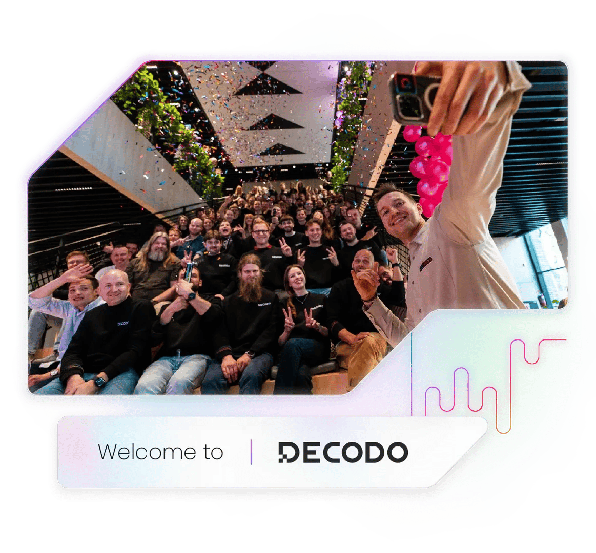 DECODO team taking a selfie with confetti and balloons in a modern office, Welcome to | DECODO